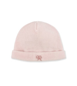 Light pink beanie hat with a folded brim and a small bow detail.