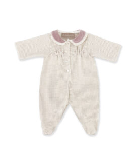 Light-colored baby onesie with short sleeves, a velvet collar, and button closure.