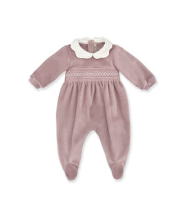 Light pink baby onesie with a white collar and decorative stitching.
