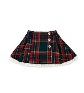Red and green plaid skirt with white buttons and a ruffled hem.