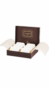A brown box opens to reveal several white soap bars, labeled "F. Rancé 1795.