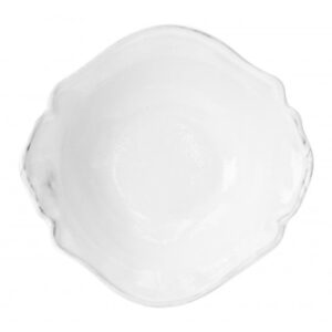 White, scalloped bowl viewed from above, empty and smooth.