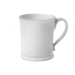 White ceramic mug with a simple design and a curved handle.