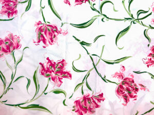 Floral duvet cover features pink tulip designs with green leaves on a white background.