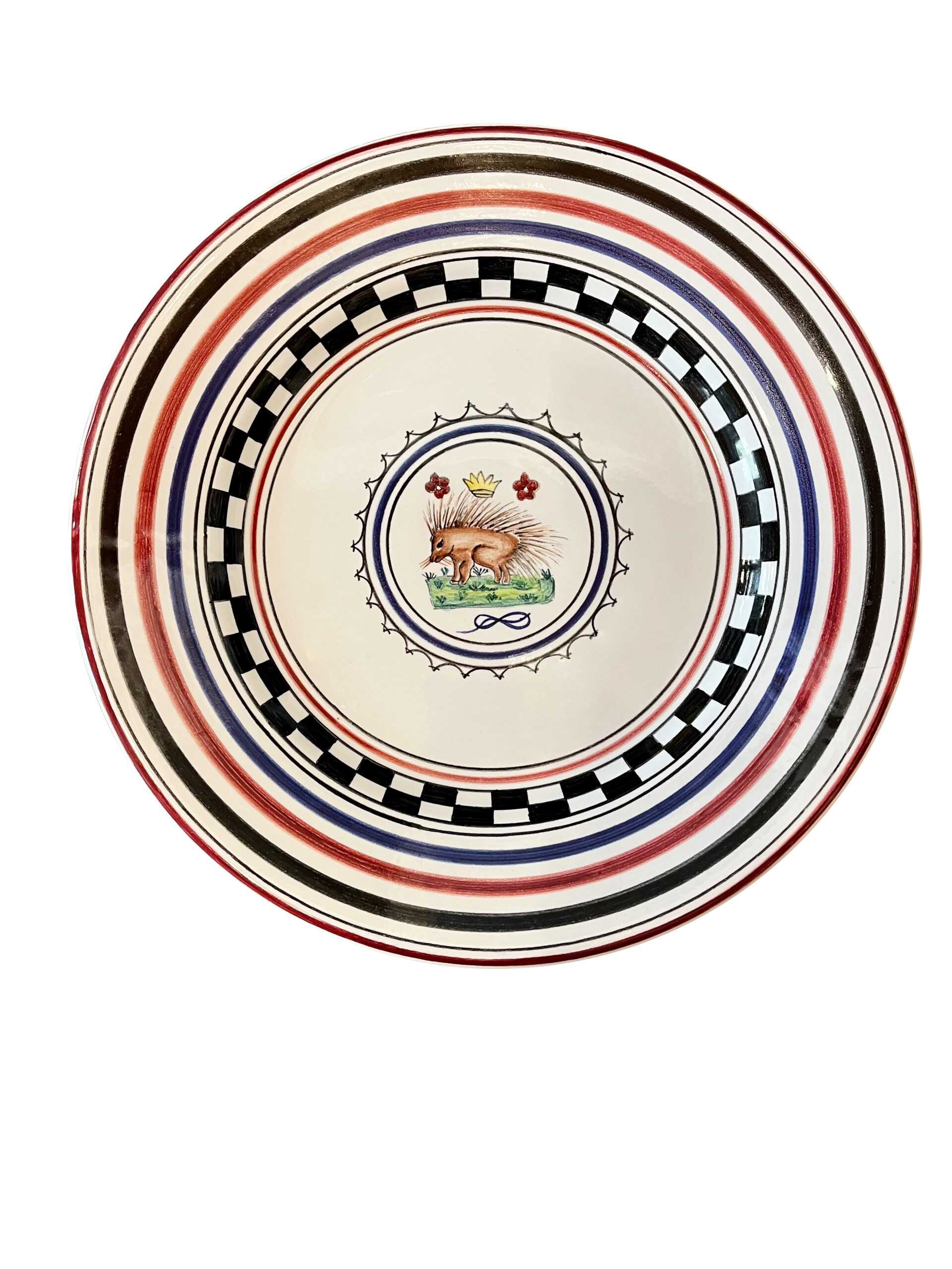 f-lli-mari-palio-istrice Ceramic plate featuring colorful concentric stripes and a central illustration of a hedgehog.