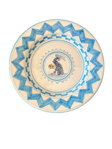 Ceramic plate featuring a blue wave design and a fish illustration in the center.
