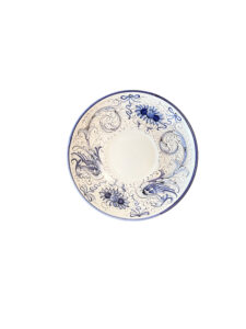 Blue and white saucer with floral designs and a central circular area.