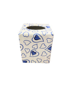 Tissue box with a blue heart pattern on a white background, featuring a top opening.