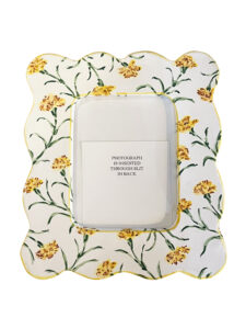 Decorative picture frame with yellow carnations, featuring a slot for inserting a photograph at the back.