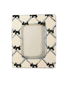 Small picture frame decorated with black Scotty dog illustrations on a light background.