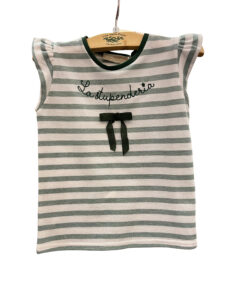 Green and white striped shirt with embroidered text and a bow, hanging on a wooden hanger.