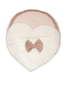 Heart-shaped sleeping bag with a soft white exterior and pink checkered top, featuring a bow detail.