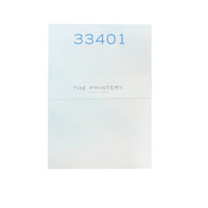A white notepad with the number "33401" in blue and "THE PRINTERY" printed below.