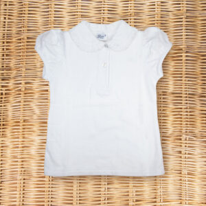 White short-sleeve polo shirt with a ruffled collar, laid flat on a woven surface.
