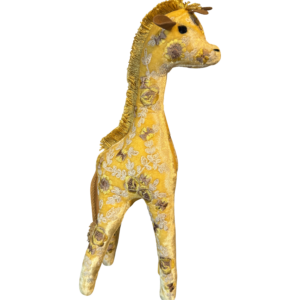 A yellow giraffe figurine with floral patterns stands upright, showcasing intricate detailing.