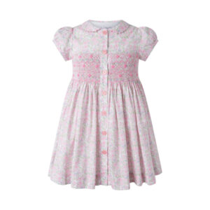 Light pink dress with floral pattern, short puff sleeves, and button front.