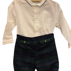 White collared shirt with buttons paired with black watch plaid shorts featuring decorative buttons.