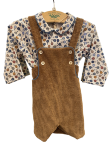 Brown corduroy overall set with a patterned long-sleeve shirt featuring colorful pickleball designs.