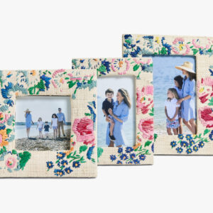 Three decorative photo frames with family pictures, featuring children and adults by the beach.