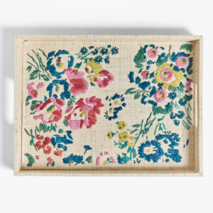 Embroidered tray featuring colorful floral designs in pink, blue, and yellow on a natural background.