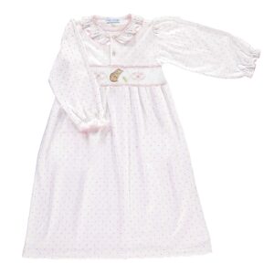 Light pink nightgown with polka dots and a teddy bear embroidery on the bodice. Long sleeves and ruffled collar.
