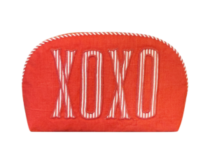 Red round zip pouch with "XOXO" embroidered in white and pink stripes.