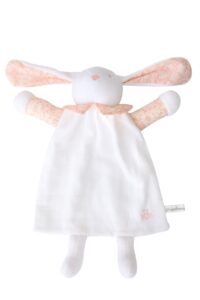 A soft, plush bunny doll with patterned ears and a white body, featuring a floral collar.