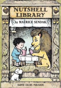 A boy and a lion read books together at a small table, with a puppy nearby.