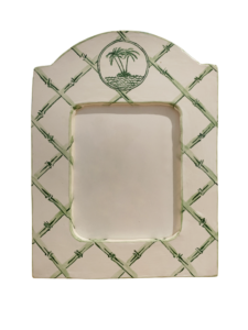 Large picture frame features a trellis design with palm trees at the top. Empty space for a photo.