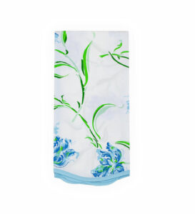 A white fabric featuring blue floral patterns and green leaves, with a light blue hem at the bottom.