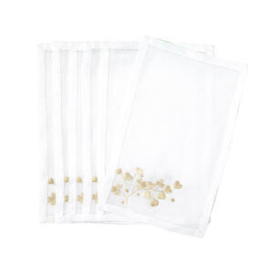 Set of white napkins with delicate gold floral embroidery along the edges.
