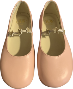 Pale pink girls' shoes with a star-embellished strap.