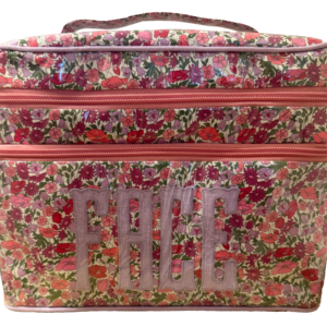 Floral-patterned double zip bag with pink accents and the word "FACE" prominently displayed.