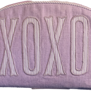 Lavender pouch with "XOXO" embroidered in striped white letters.