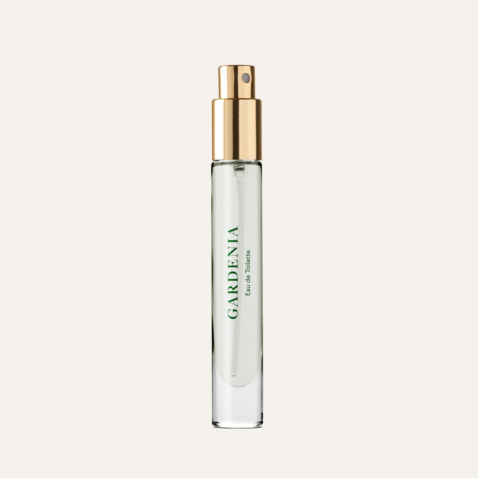 Clear glass perfume bottle with a gold spray nozzle, labeled "Gardenia Eau de Toilette.