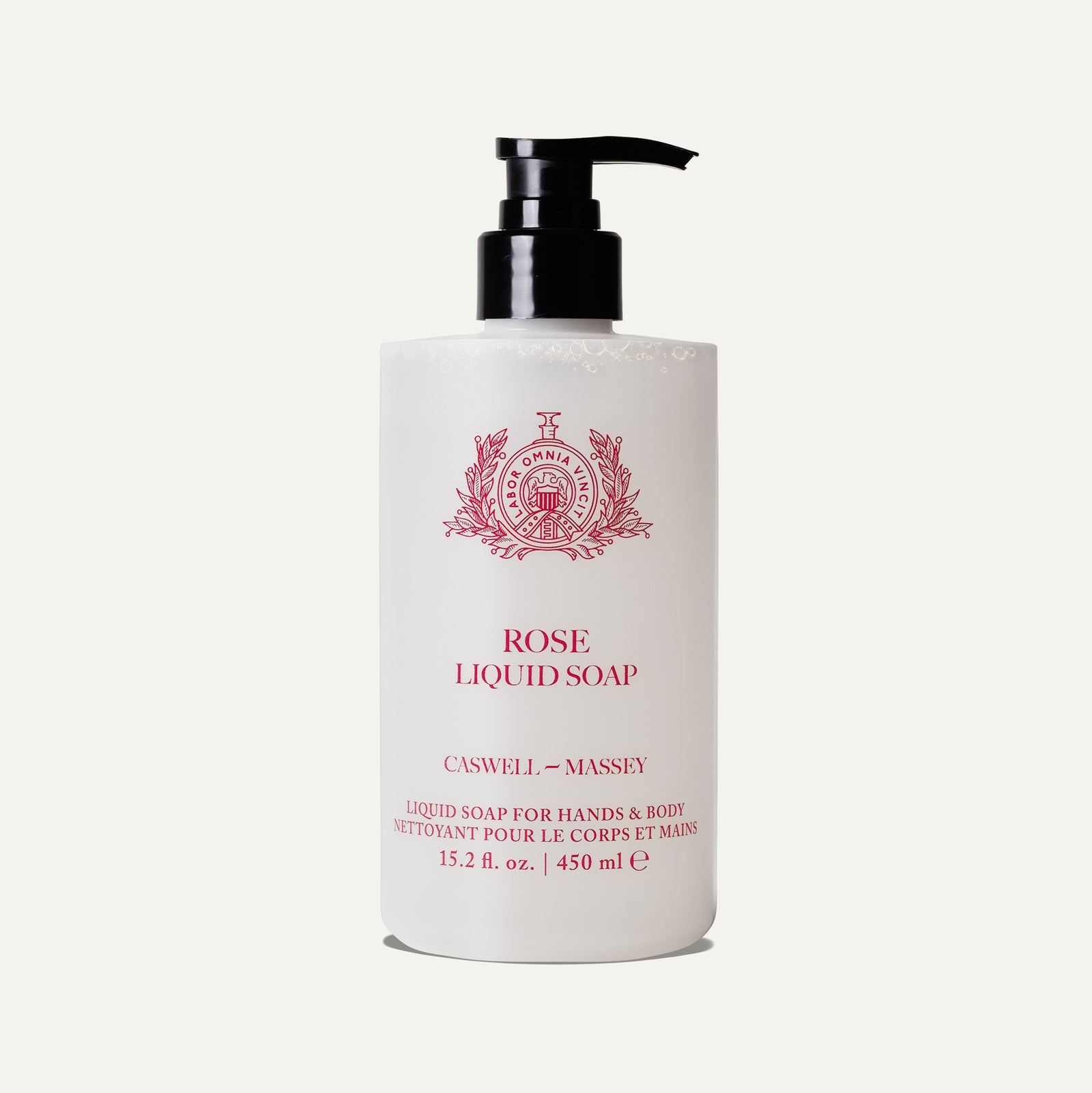 Clear bottle of rose liquid soap with a pump, labeled for hands and body use.