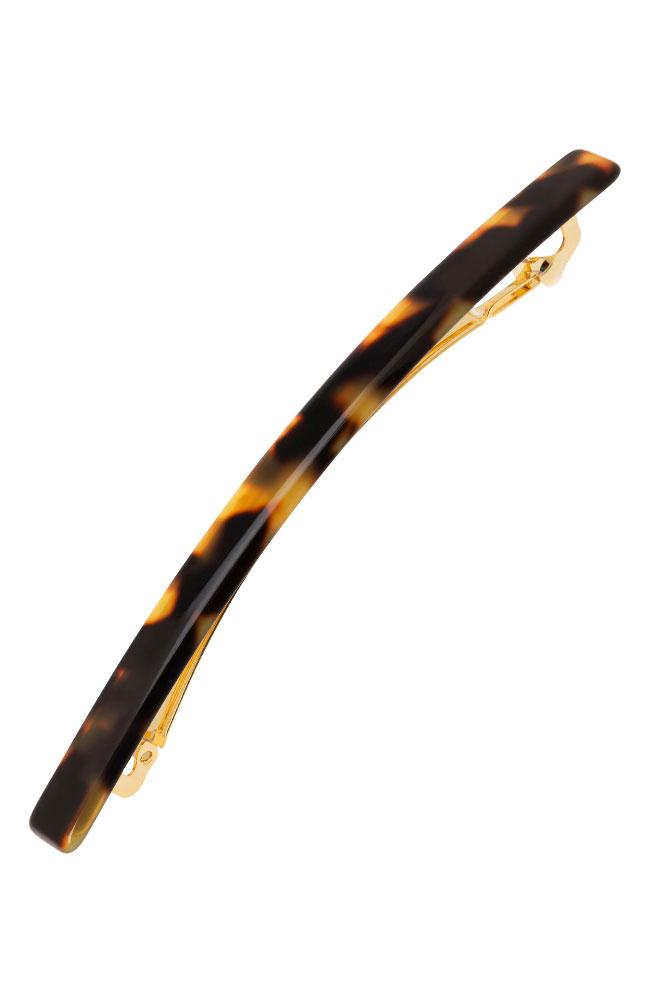 A tortoiseshell hair clip with a gold clasp, designed for securing hair.