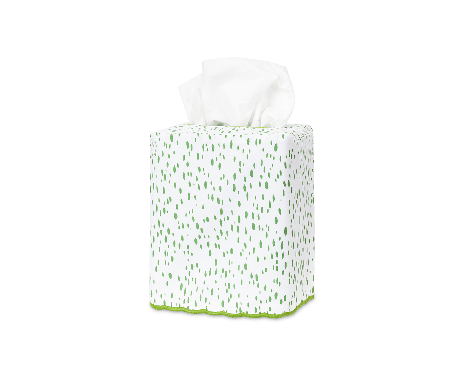 A tissue box with a white and green dotted design, featuring tissues partially pulled out.