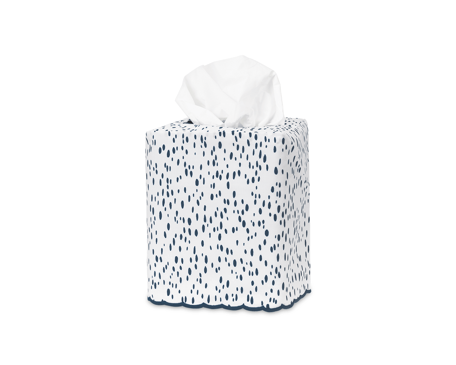 Square tissue box with a white and navy dotted design, featuring a tissue partially pulled out.