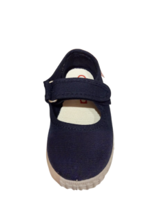 Navy blue Mary Jane shoe with a strap and white sole, viewed from above.
