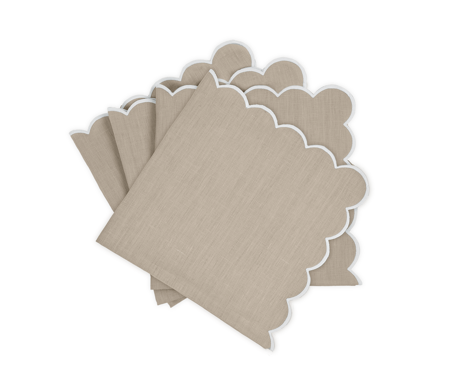 Stack of oat white napkins with scalloped edges, arranged neatly.