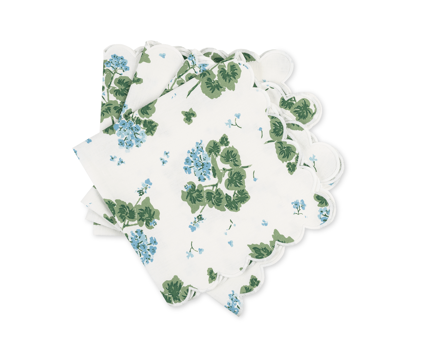 Stack of white napkins with blue flowers and green leaves, featuring scalloped edges.