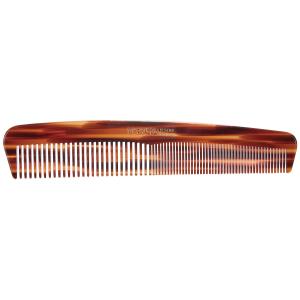 A tortoiseshell-patterned dressing comb with fine and wide teeth.