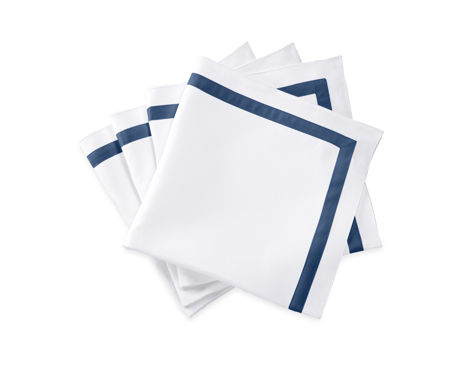 Stack of white napkins with a navy blue border, arranged neatly on a green background.
