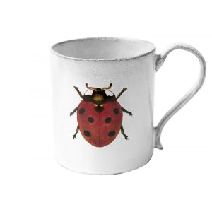 Astier de Villatte white ceramic mug with a small red ladybug